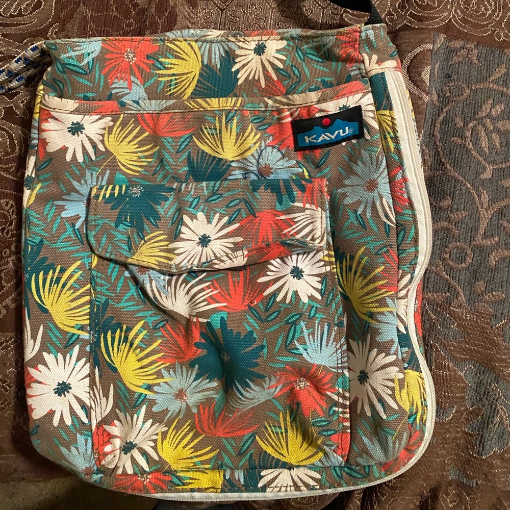 Kavu shoulder bag w/ pink, blue, and yellow print.